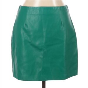 Lulus’s green faux vegan leather mini skirt